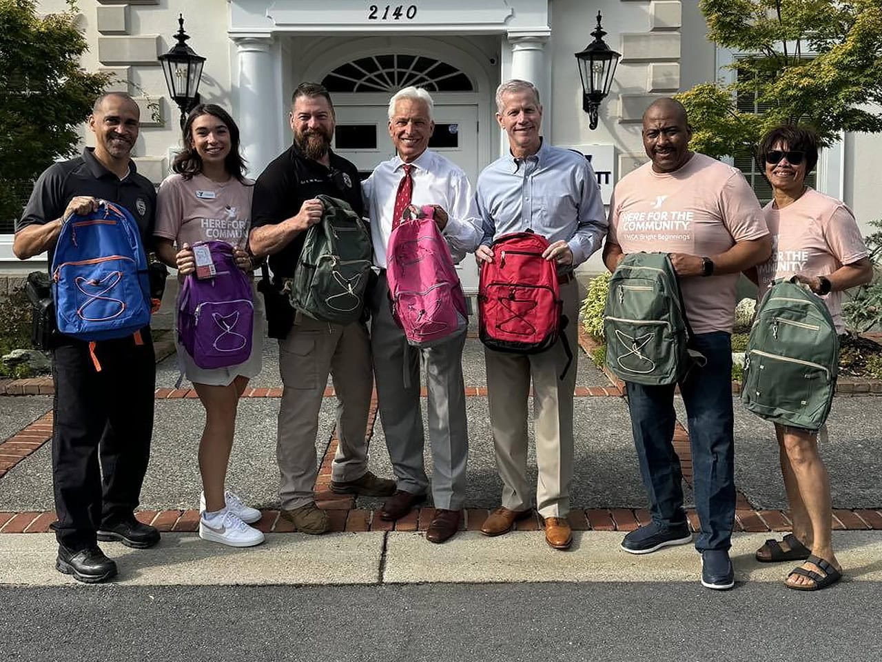 David Daggett and Griff Shuler with Back-to-School Backpack Program volunteers