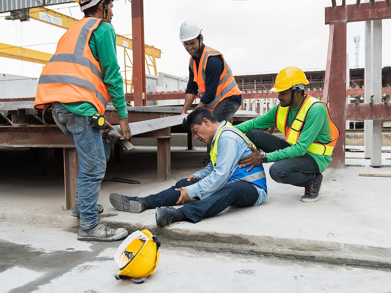 Man with leg injury at work