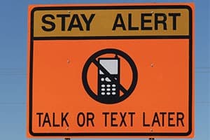 texting-and-driving-road-sign